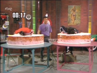 Spanish show head dunk in pies