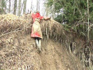 In search of mud (in red rubber raincoat)