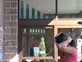 Two girls pie each other