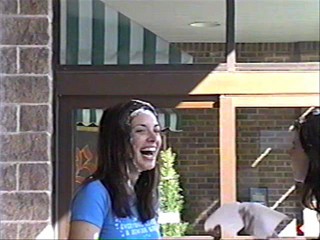 Two girls pie each other