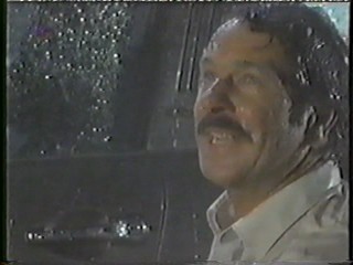 German movie - long red dress in rain