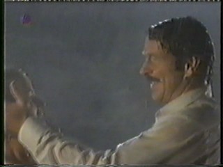 German movie - long red dress in rain