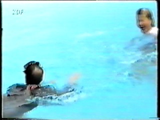 German Movie - dressed pool jump
