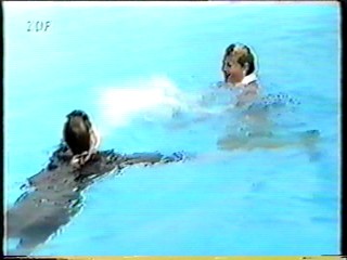 German Movie - dressed pool jump