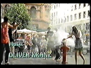 German movie - black dress in fountain