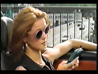 German movie - black dress in fountain