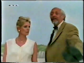 RTL - lady wading wearing white trousers-qt