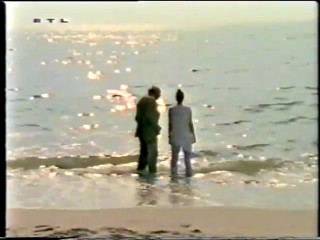 RTL - lady wading wearing white trousers-qt