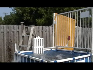 Violet dunked in a black bikini