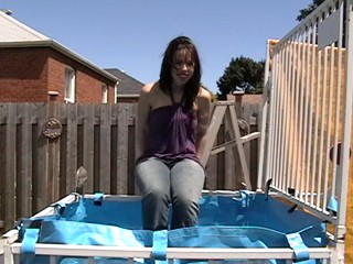 Ashley Dunked In Blue Jeans and a Purple Top