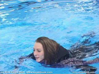 EE Wetlook, sample of Lisette in winterclothes in swimming pool