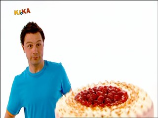 Male presenter caked