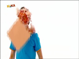 Male presenter caked