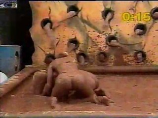 Girl mud wrestling!