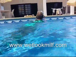 Wetlook Milf swimming in Shiny catsuit