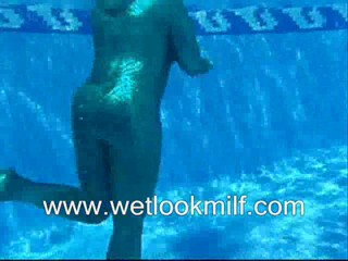 Wetlook Milf swimming in Shiny catsuit