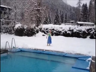 Girl jumps in pool