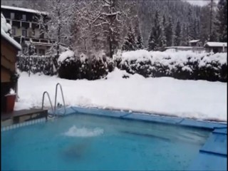 Girl jumps in pool
