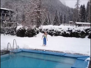 Girl jumps in pool