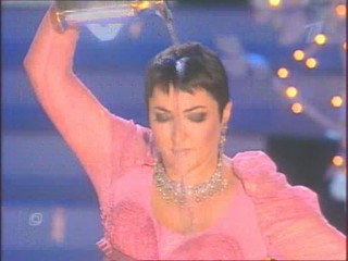 Singer Pours Water On Herself