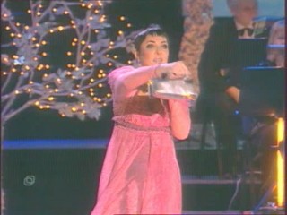 Singer Pours Water On Herself