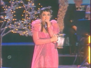 Singer Pours Water On Herself