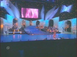 Singer Pours Water On Herself