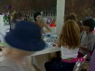 Girls Camp - A  messy cake face scene.