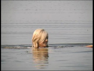 White dress on beach wetlook