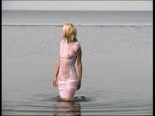 White dress on beach wetlook