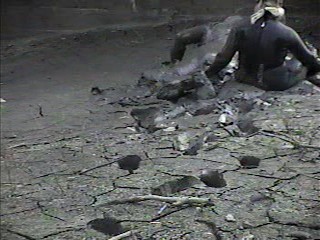 Rubber wetsuits in mud