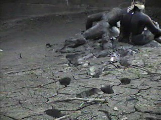 Rubber wetsuits in mud