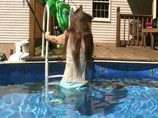 Clips from Jennifer's long aqua skirt video