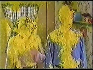 A Man & Women get Covered in Yellow Gunge