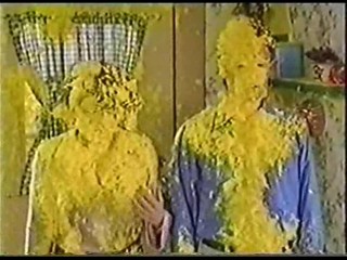 A Man & Women get Covered in Yellow Gunge