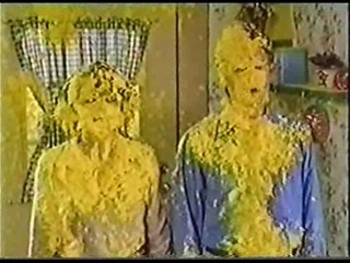 A Man & Women get Covered in Yellow Gunge