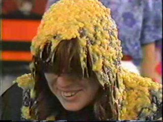 Women gets Cream Corn Poured over her head