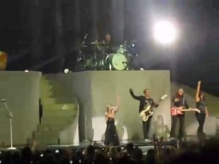 Taylor Swift performing in rain