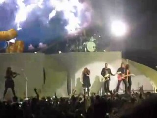 Taylor Swift performing in rain