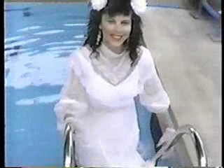 Gill in a wedding dress,  Sammy in yellow