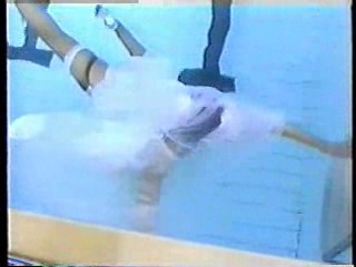 Gill in a wedding dress,  Sammy in yellow