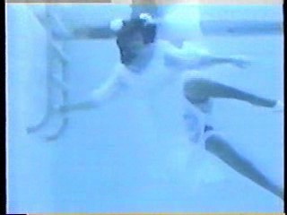 Gill in a wedding dress,  Sammy in yellow