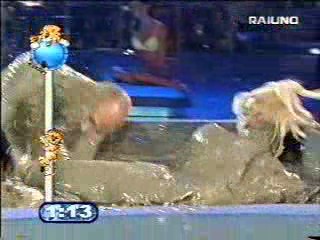 Mud wrestling (2 girls against 1 guy)