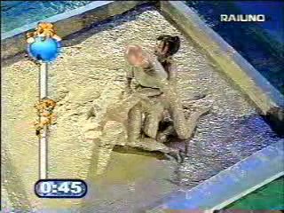 Mud wrestling (2 girls against 1 guy)