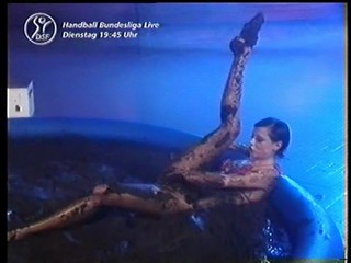 German gal plays in mud