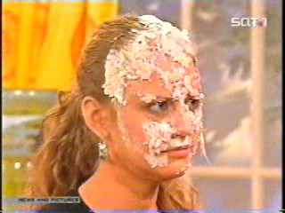 women caked on TV show
