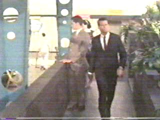 woman goes through car wash