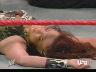 wwe:- Lita sprayed in the face with mustard
