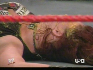 wwe:- Lita sprayed in the face with mustard