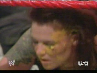 wwe:- Lita sprayed in the face with mustard